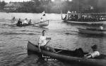 People cboating on Lake Boon - 1 canoe, 1 larger multi-pasenger boat, 1 motorboat